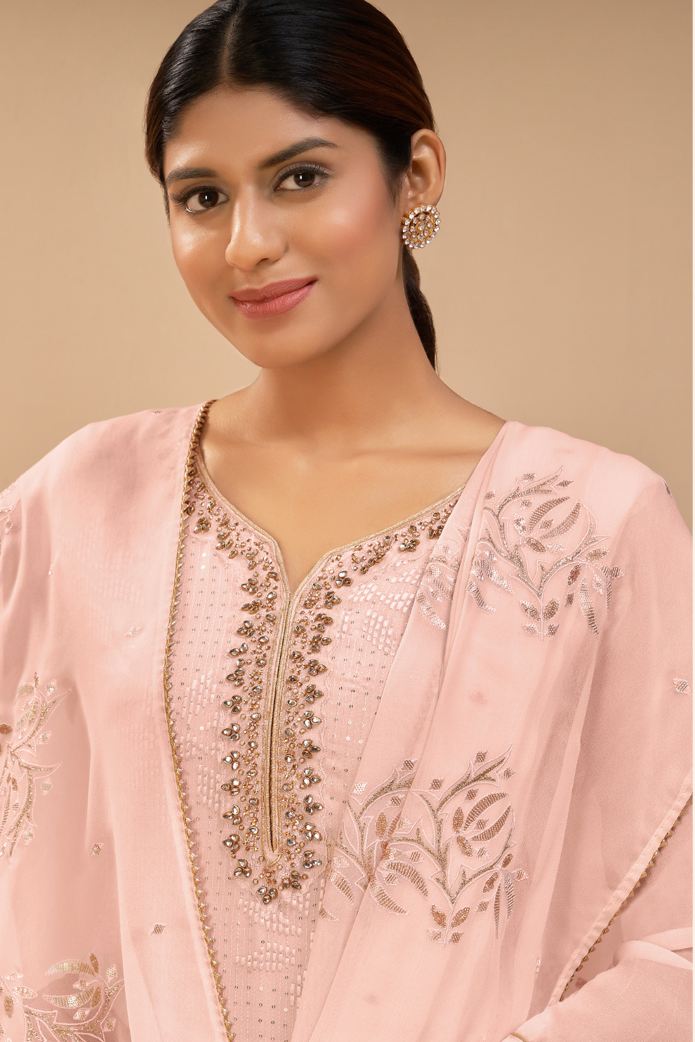 Peach Georgette Palazzo Style Suit with Intricate Embroidery