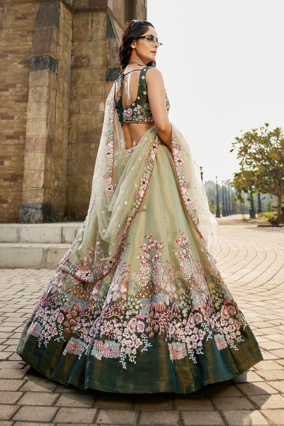 Stylish Net Lehenga Choli & Dupatta Highlighted with Sequins Embroidery