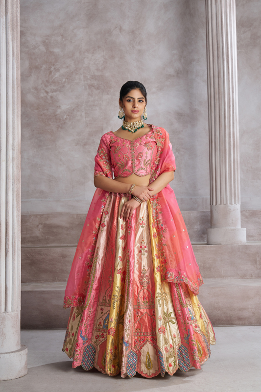 Elegant Pink Wedding Lehenga with Intricate Embroidery and Paisley Work