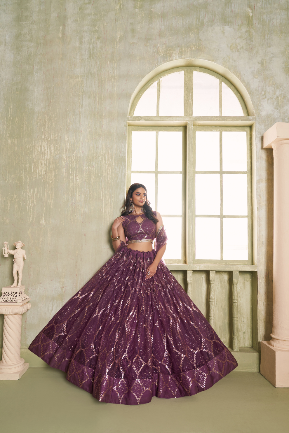 Stylish Wine Embroidered Net Lehenga Choli for Special Occasions