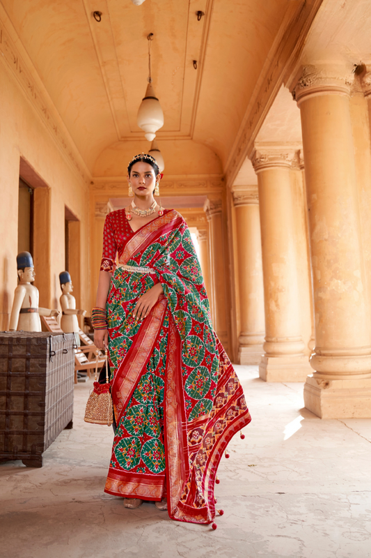 Artisanal Patola Silk Saree with Elegant Tassel Touch