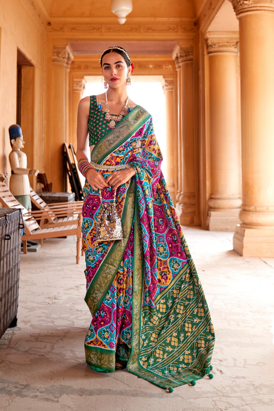 Artisanal Patola Silk Saree with Elegant Tassel Touch
