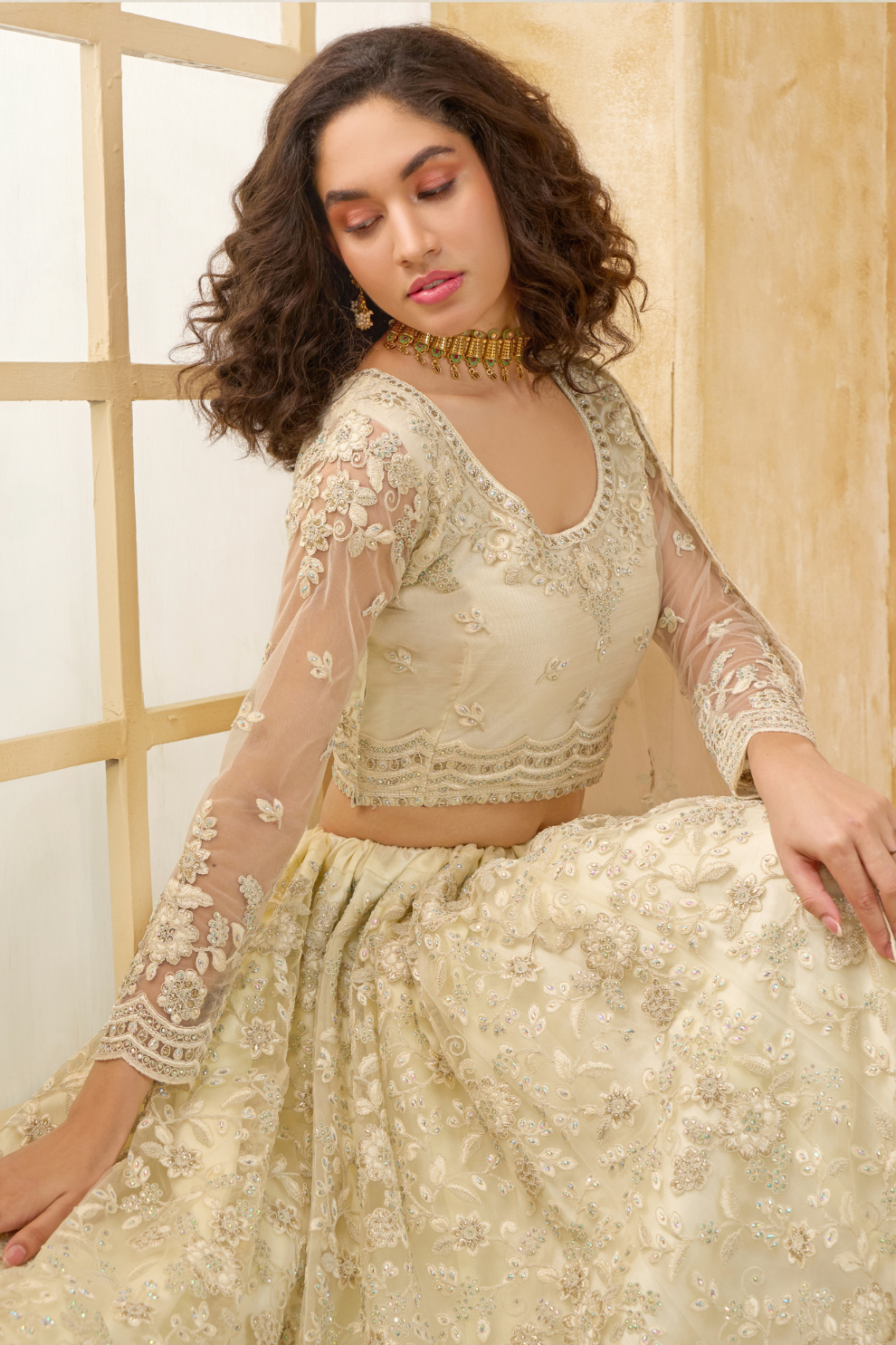 Elegant Cream Net Lehenga Choli Featuring Thread Work