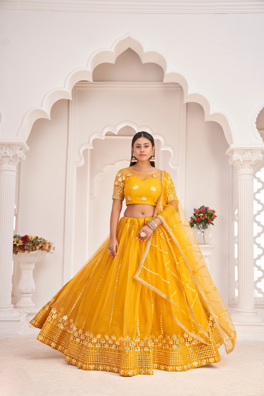 Elegant Net Lehenga Choli with Intricate Thread Embroidery