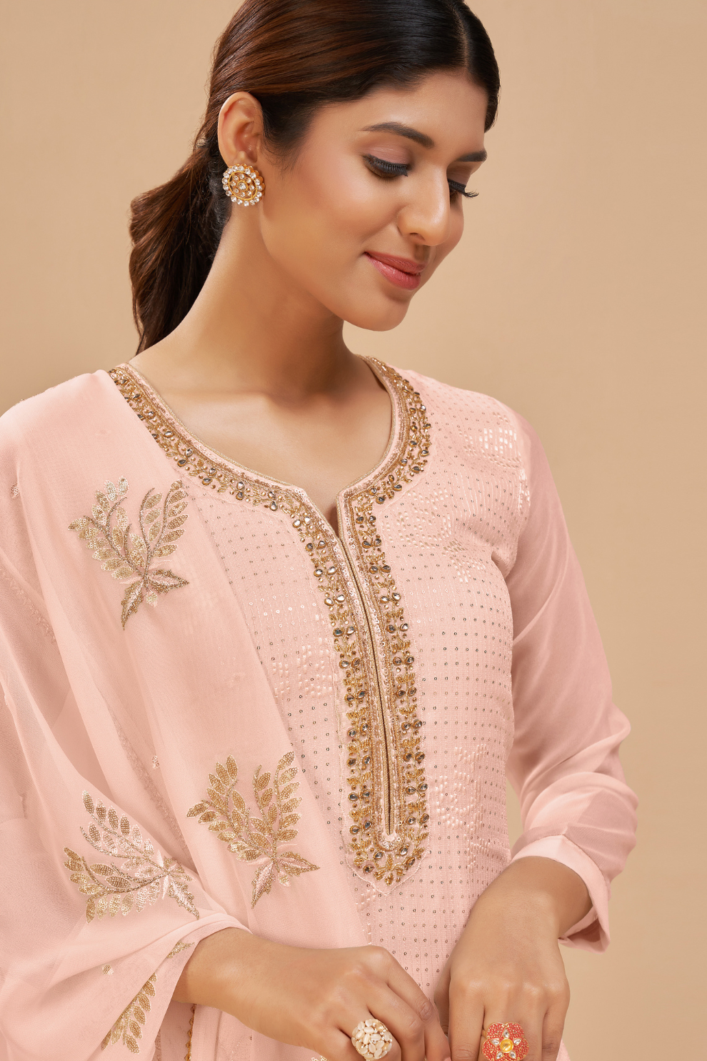 Peach Georgette Palazzo Style Suit with Intricate Embroidery