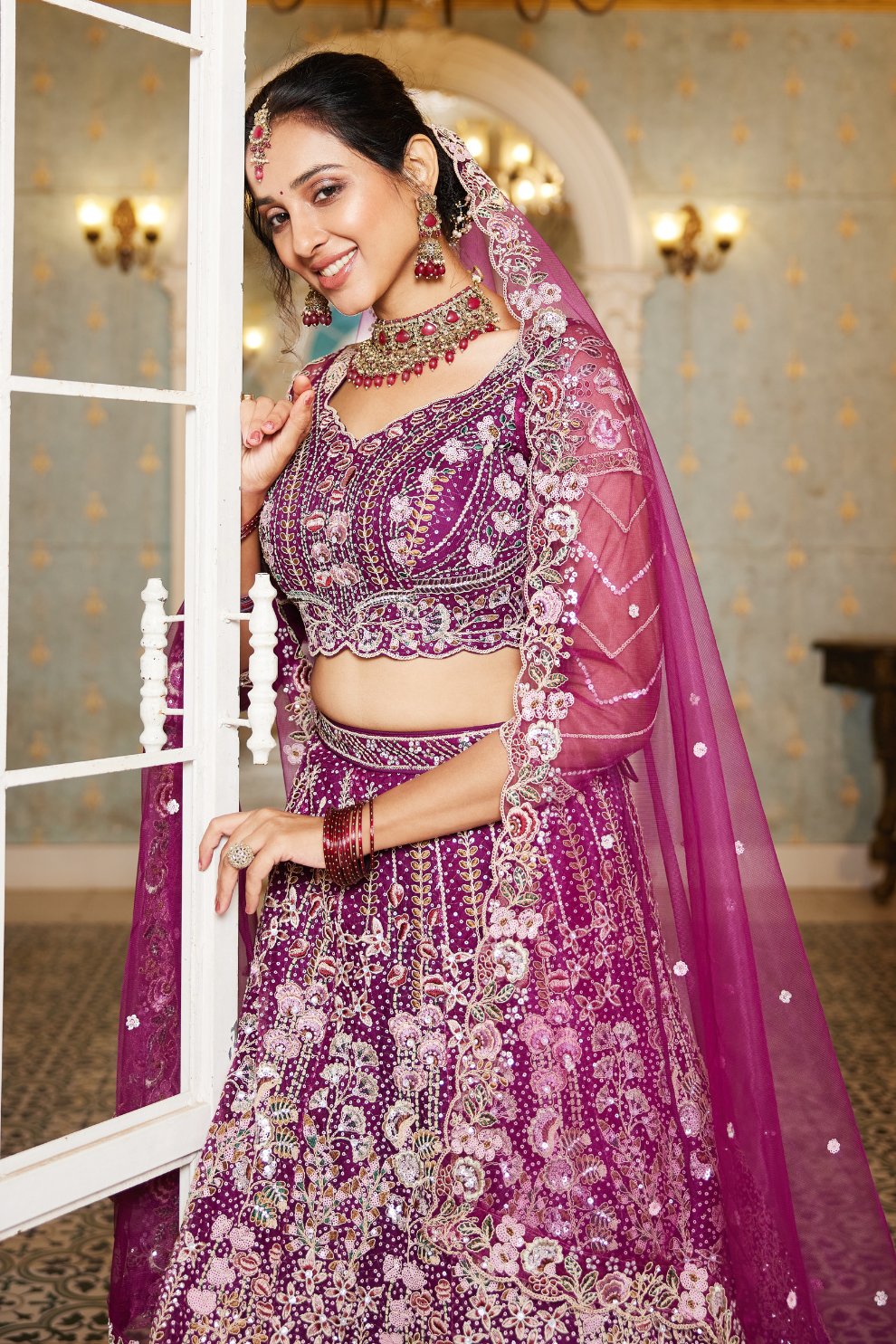 Festive Net Lehenga Choli with Rich Coding and Zarkan Accents