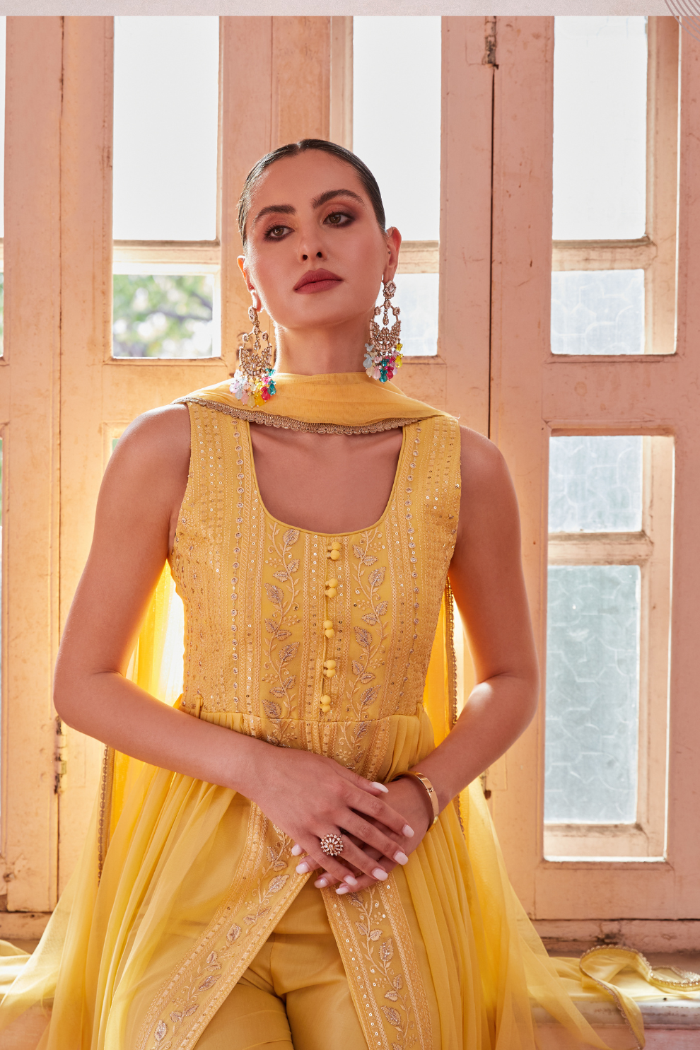 Yellow Georgette Salwar Suit with Intricate Embroidery and Sequins Work