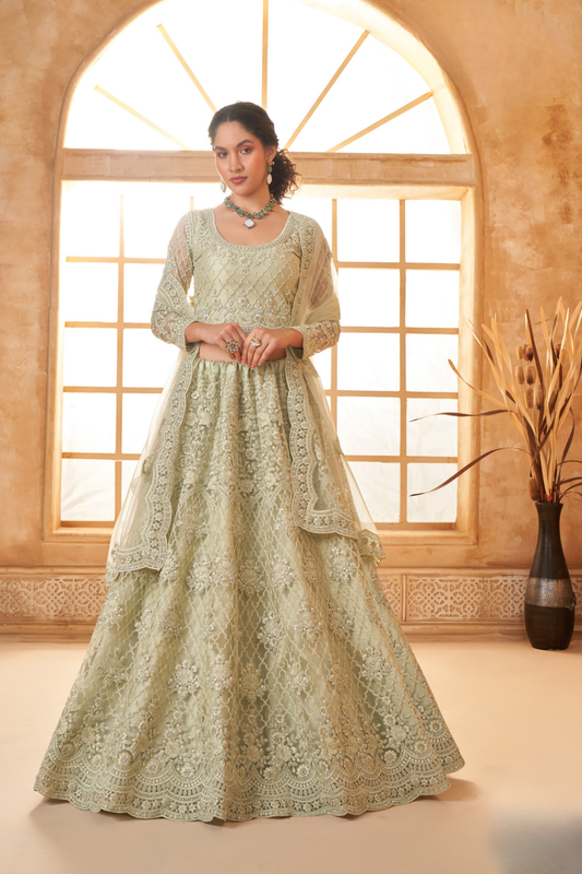 Elegant Pista Green Net Lehenga Choli With Rich Embroidery