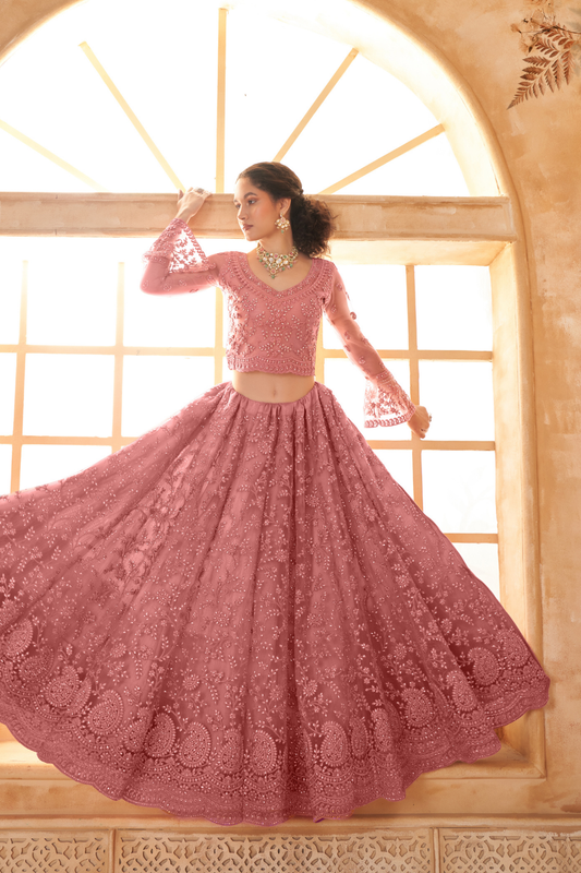 Graceful Pink Net Lehenga Choli With Intricate Thread Embroidery