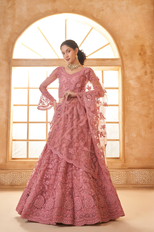 Graceful Pink Net Lehenga Choli With Intricate Thread Embroidery