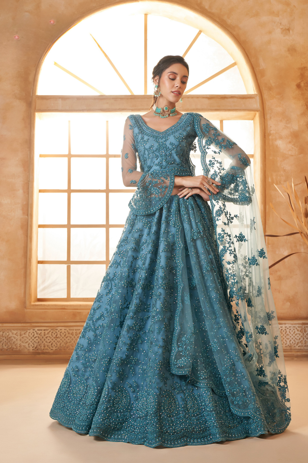 Graceful Light Blue Embroidered Net Lehenga With Sparkling