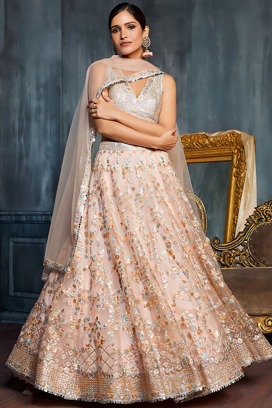 Charming Peach Sequins Net Engagement Wear Lehenga Choli With Dupatta