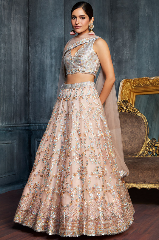 Charming Peach Sequins Net Engagement Wear Lehenga Choli With Dupatta