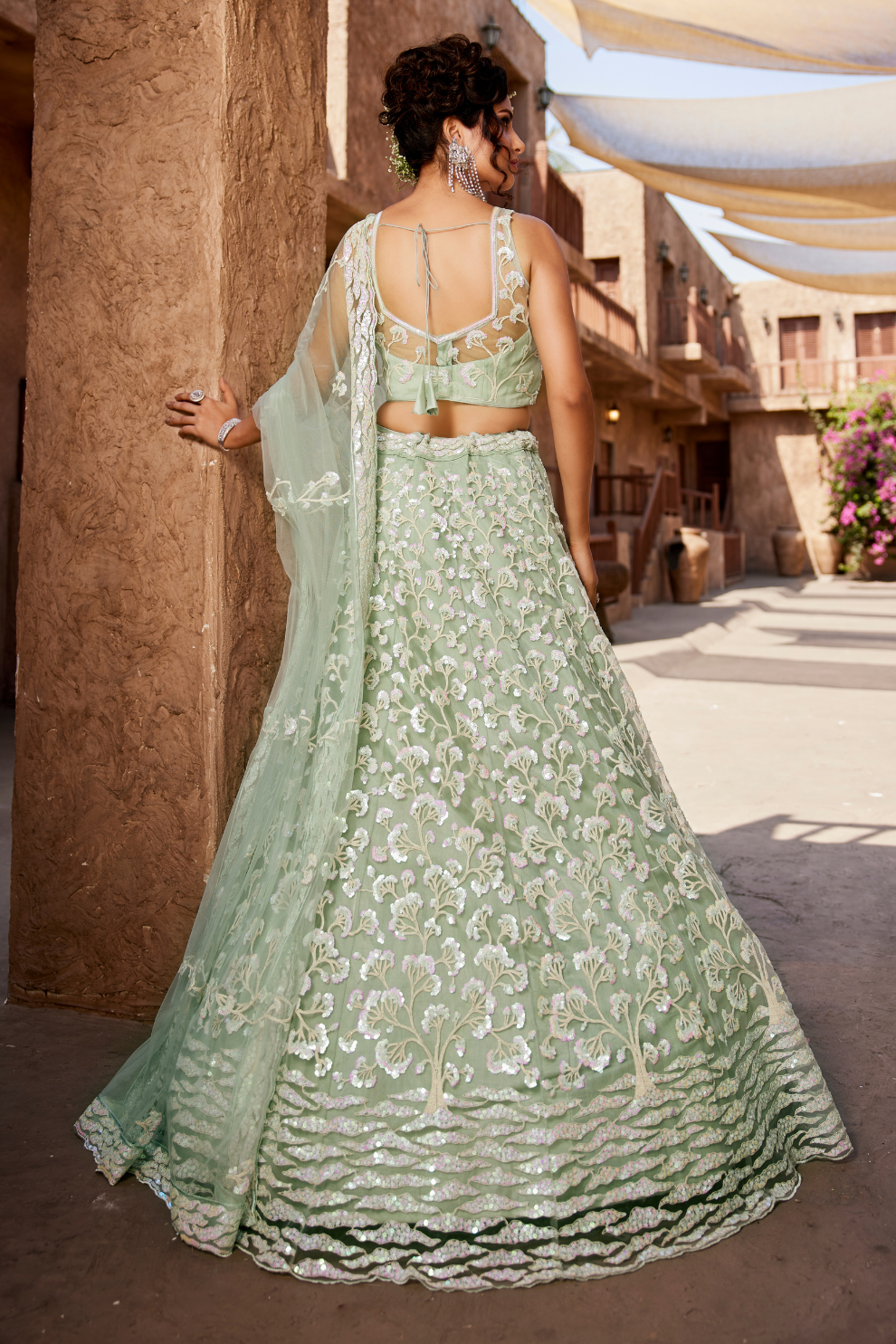 Designer Net Lehenga Choli with Sequin Embroidery and Coordinated Dupatta