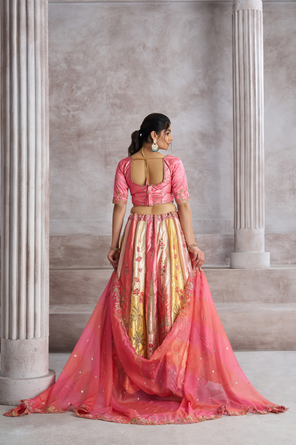 Elegant Pink Wedding Lehenga with Intricate Embroidery and Paisley Work