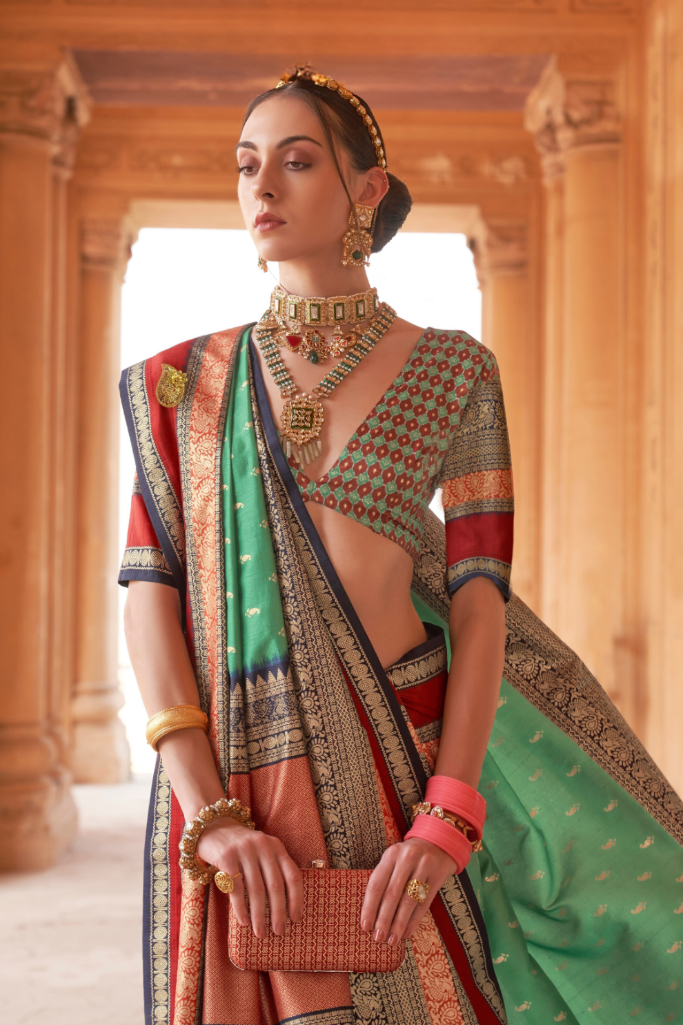 Kanjivaram Style Silk Saree with Designer Brooch and Clutch