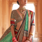Kanjivaram Style Silk Saree with Designer Brooch and Clutch