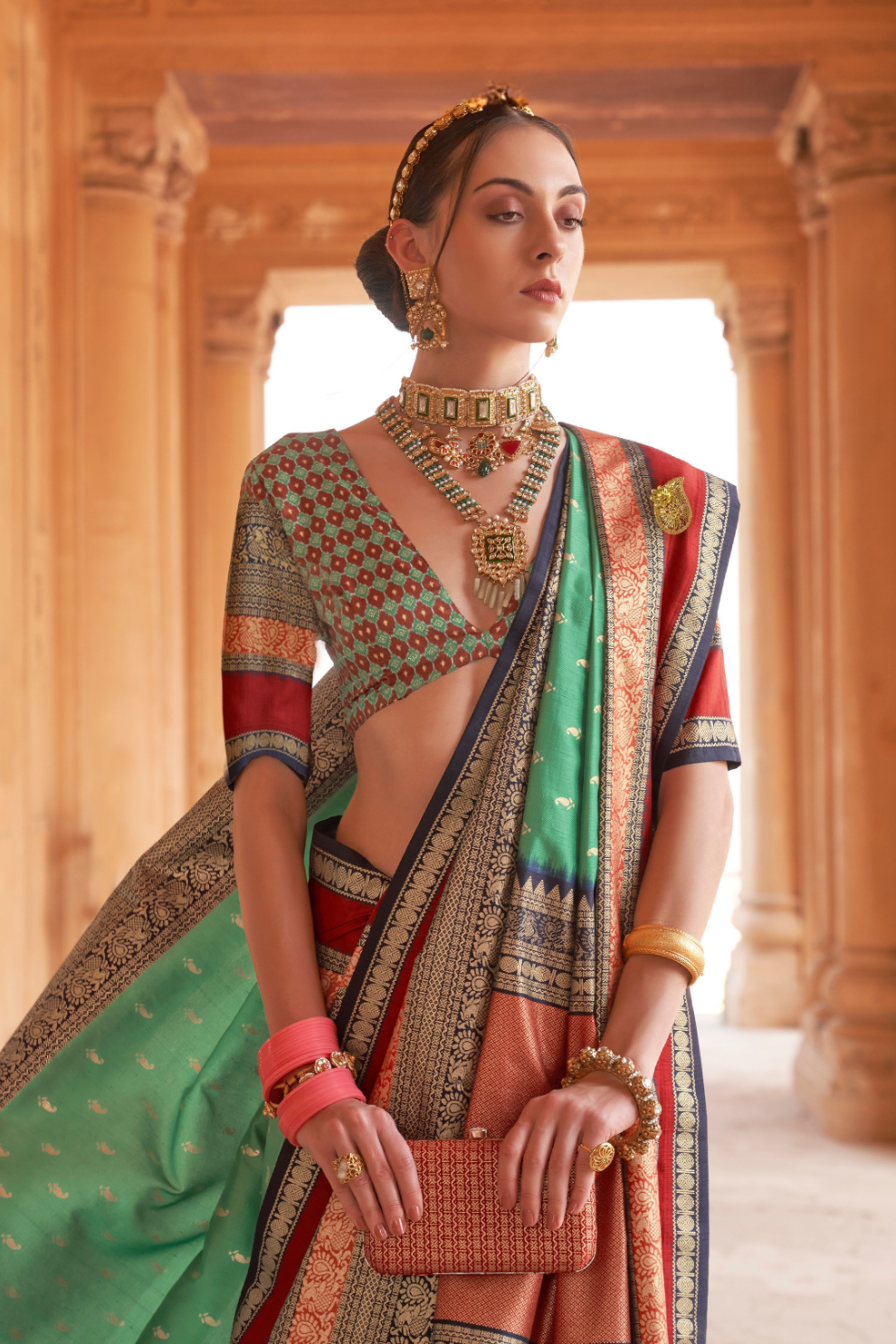 Kanjivaram Style Silk Saree with Designer Brooch and Clutch