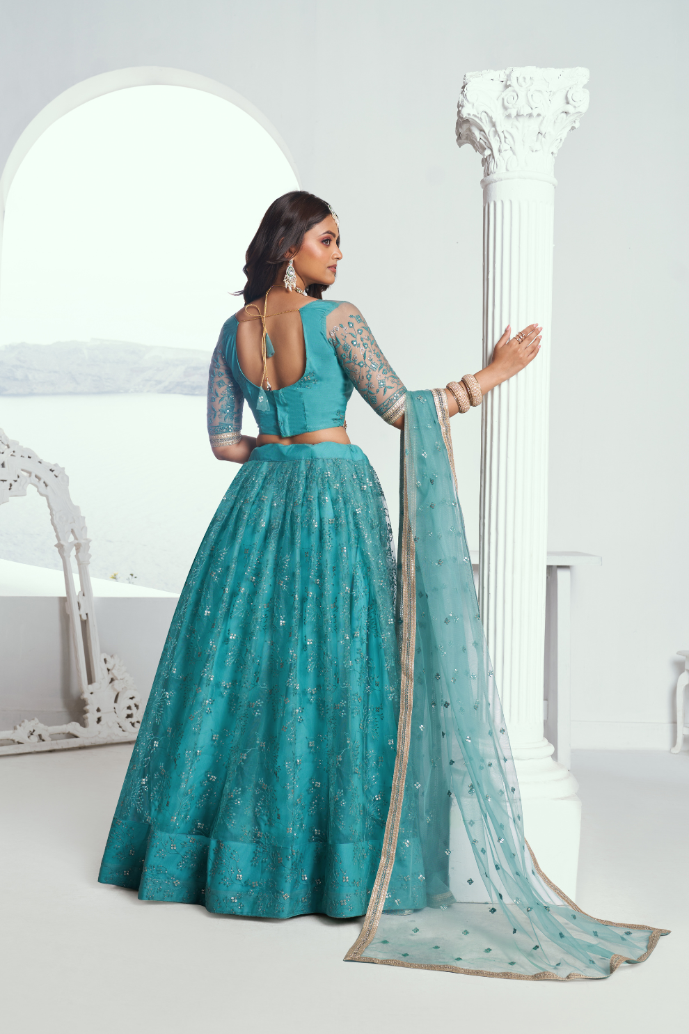Graceful Net Lehenga Choli with Intricate Embroidery for Engagement Wear