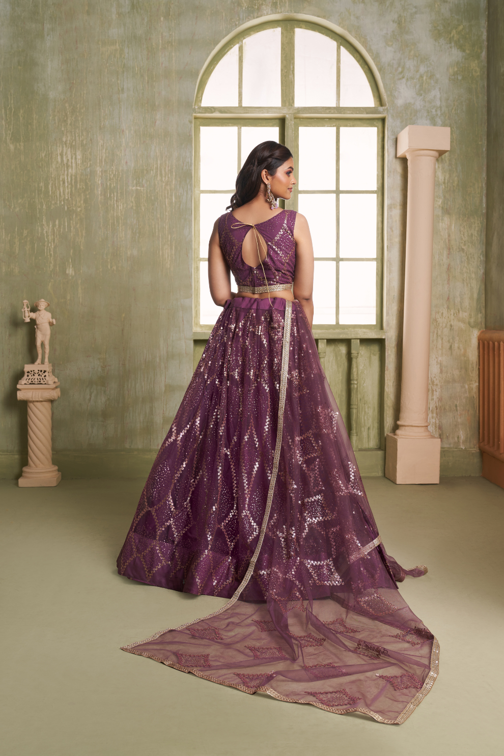 Stylish Wine Embroidered Net Lehenga Choli for Special Occasions