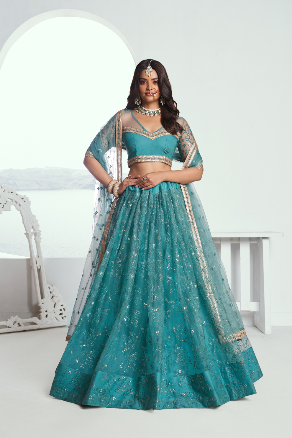 Graceful Net Lehenga Choli with Intricate Embroidery for Engagement Wear