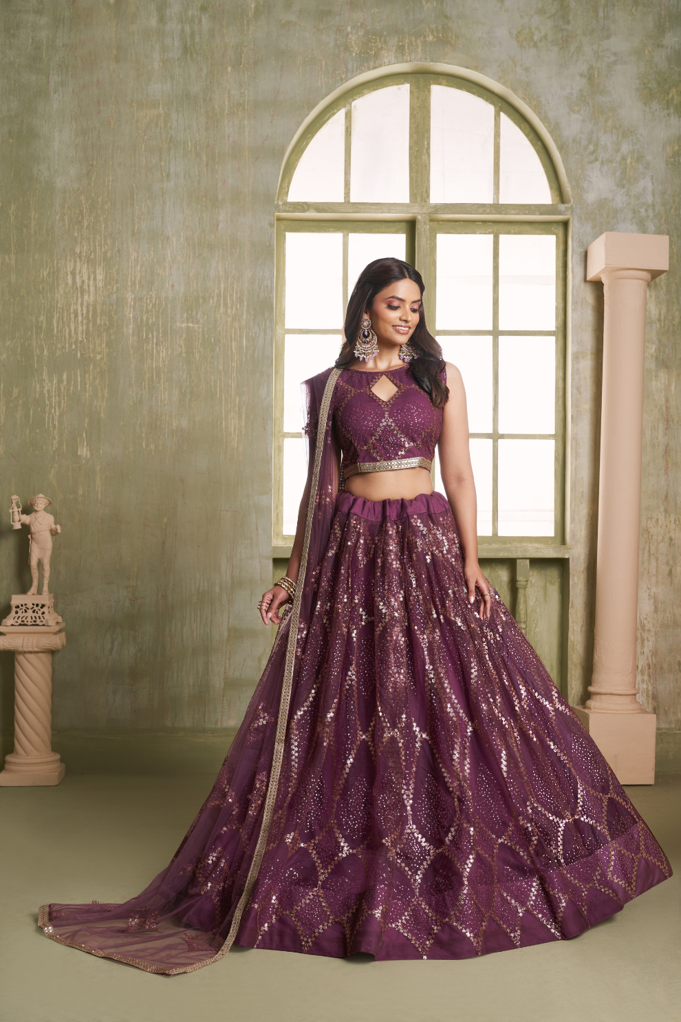 Stylish Wine Embroidered Net Lehenga Choli for Special Occasions