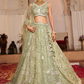 Glamorous Tissue Lehenga Choli & Dupatta with Intricate Sequins Work