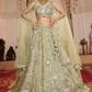 Glamorous Tissue Lehenga Choli & Dupatta with Intricate Sequins Work