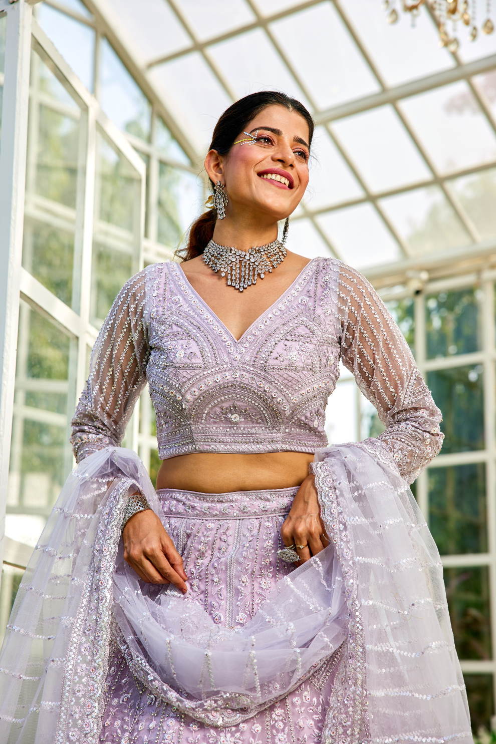 Graceful Net Lehenga Choli Ensemble with Beads