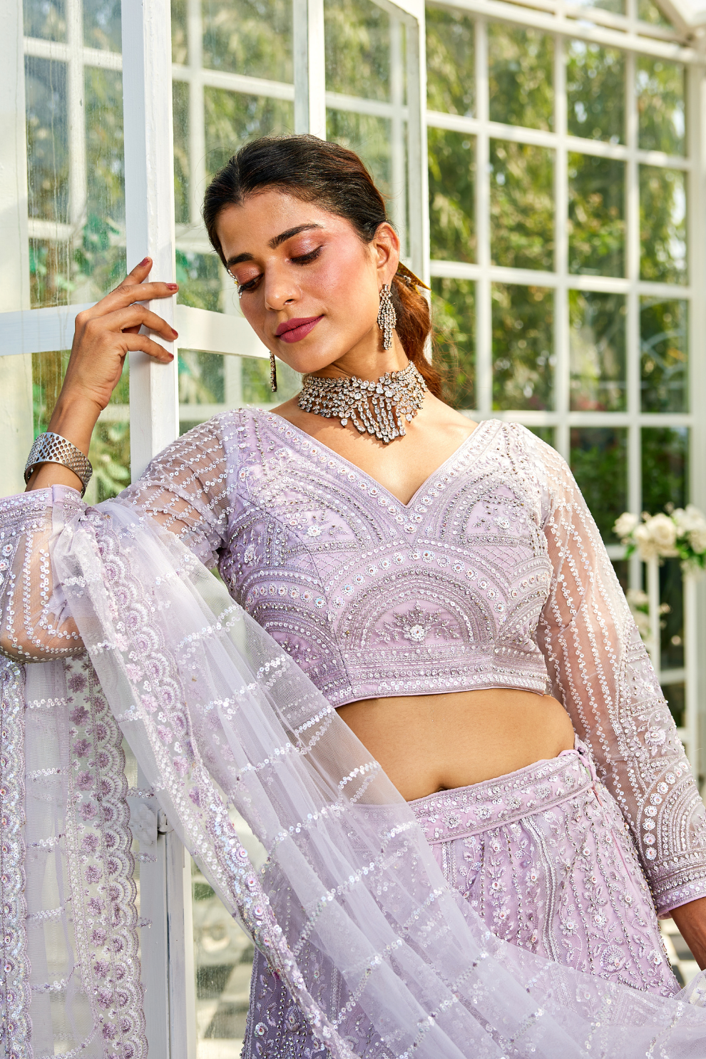 Graceful Net Lehenga Choli Ensemble with Beads