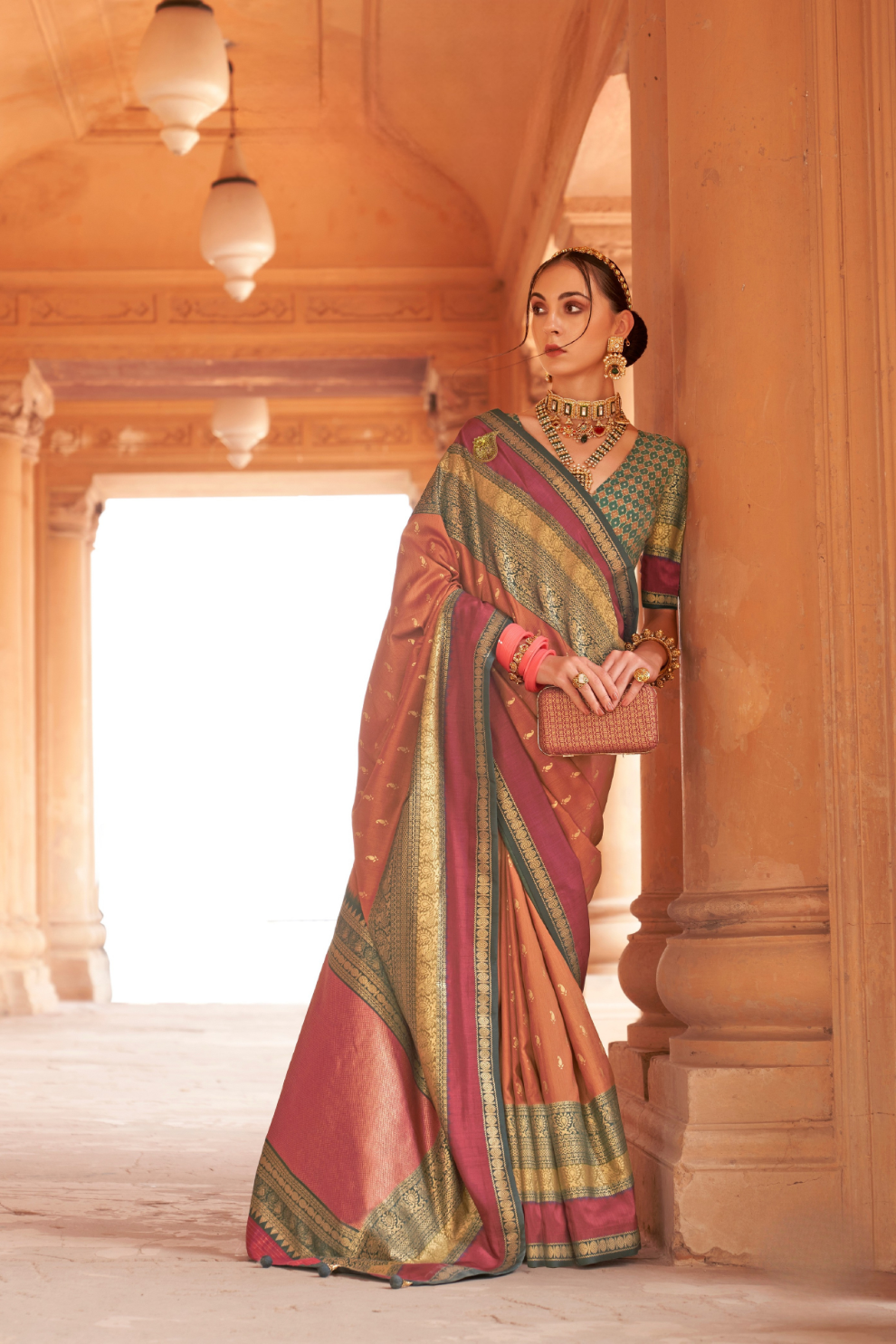 Kanjivaram Style Silk Saree with Designer Brooch and Clutch