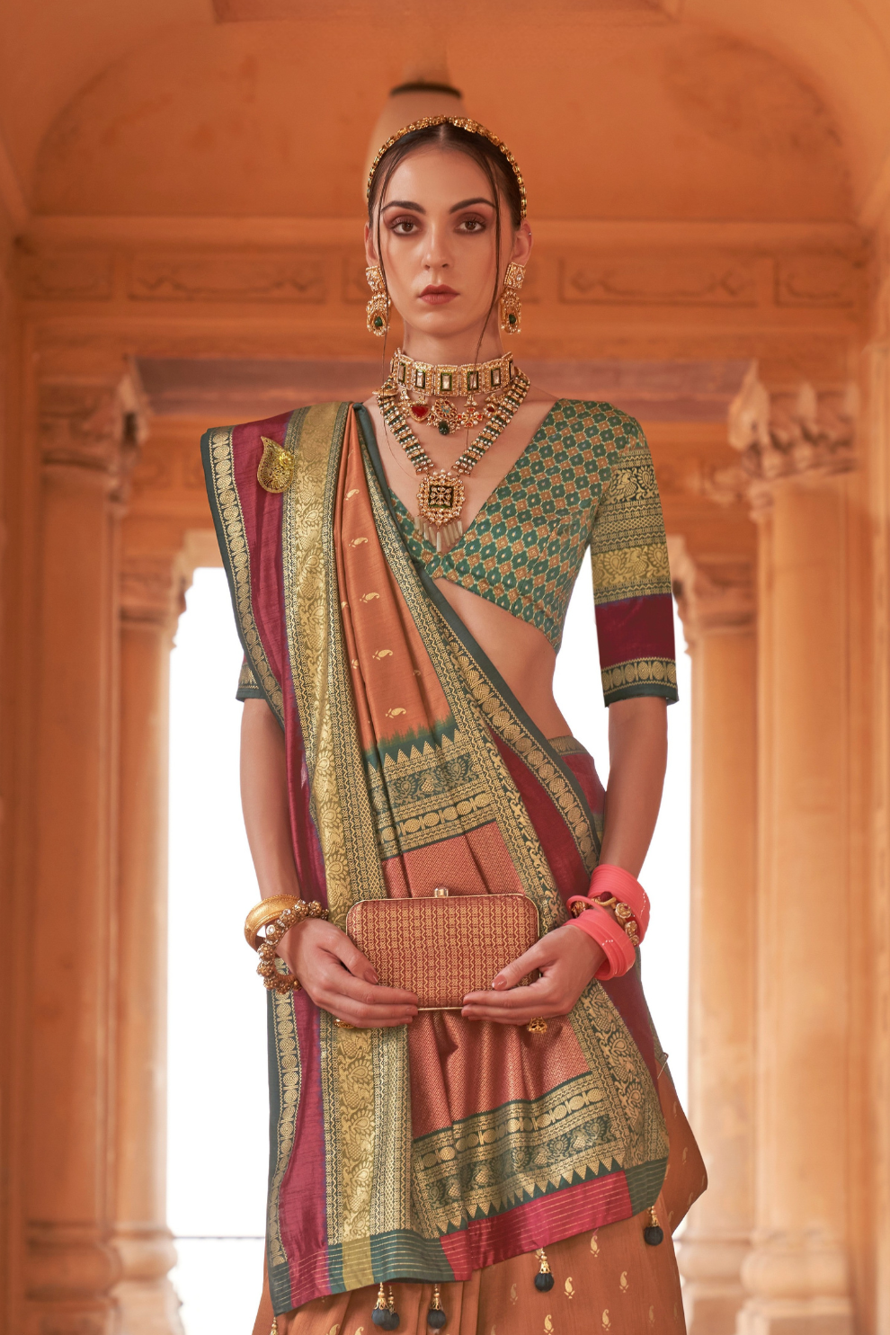 Kanjivaram Style Silk Saree with Designer Brooch and Clutch