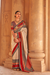 Kanjivaram Style Silk Saree with Designer Brooch and Clutch