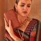 Kanjivaram Style Silk Saree with Designer Brooch and Clutch