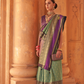 Kanjivaram Style Silk Saree with Designer Brooch and Clutch