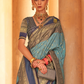Kanjivaram Style Silk Saree with Designer Brooch and Clutch