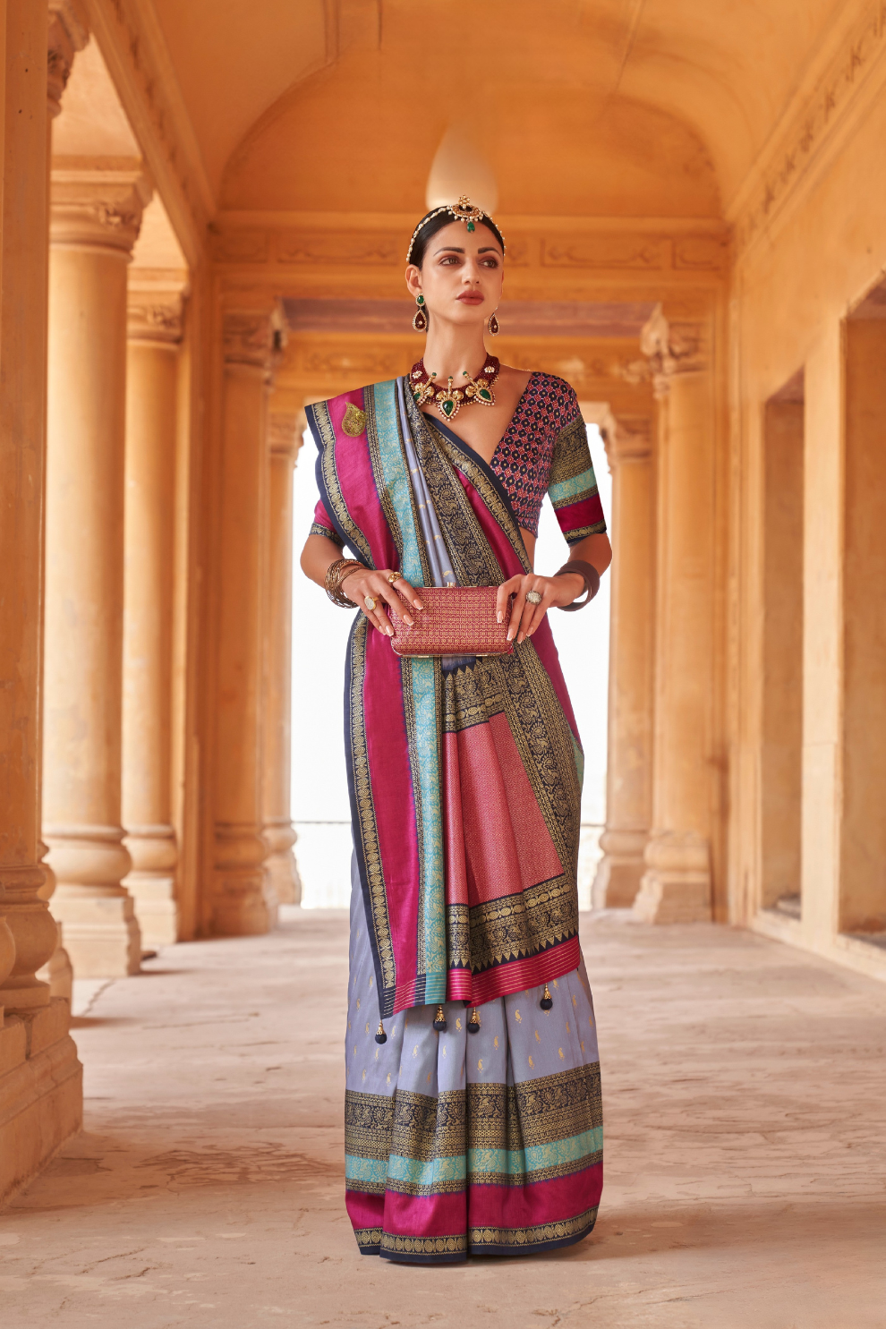 Kanjivaram Style Silk Saree with Designer Brooch and Clutch