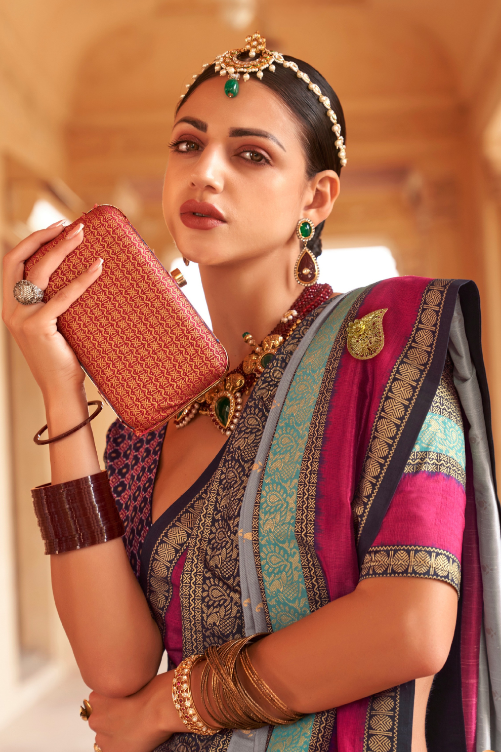 Kanjivaram Style Silk Saree with Designer Brooch and Clutch