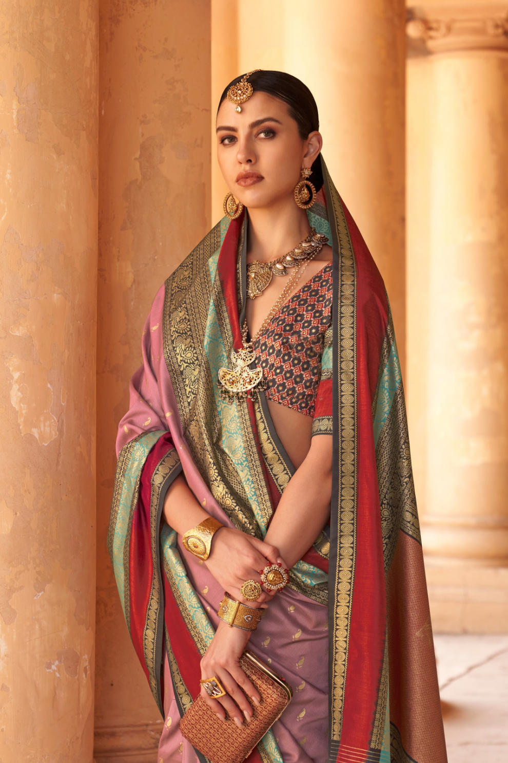 Kanjivaram Style Silk Saree with Designer Brooch and Clutch