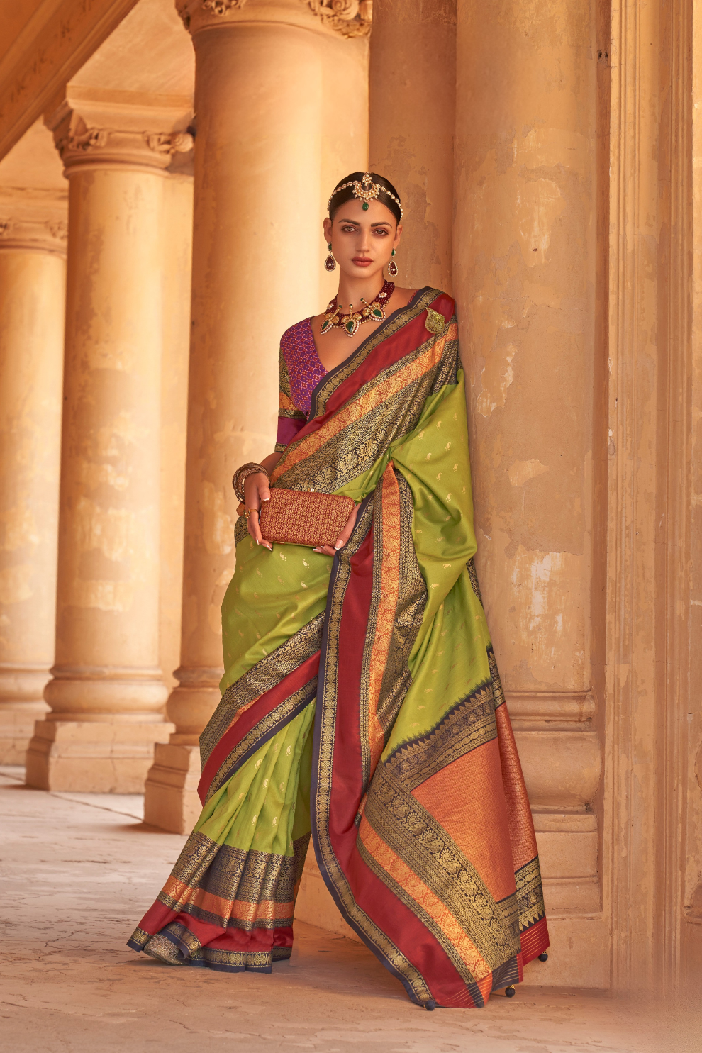 Kanjivaram Style Silk Saree with Designer Brooch and Clutch