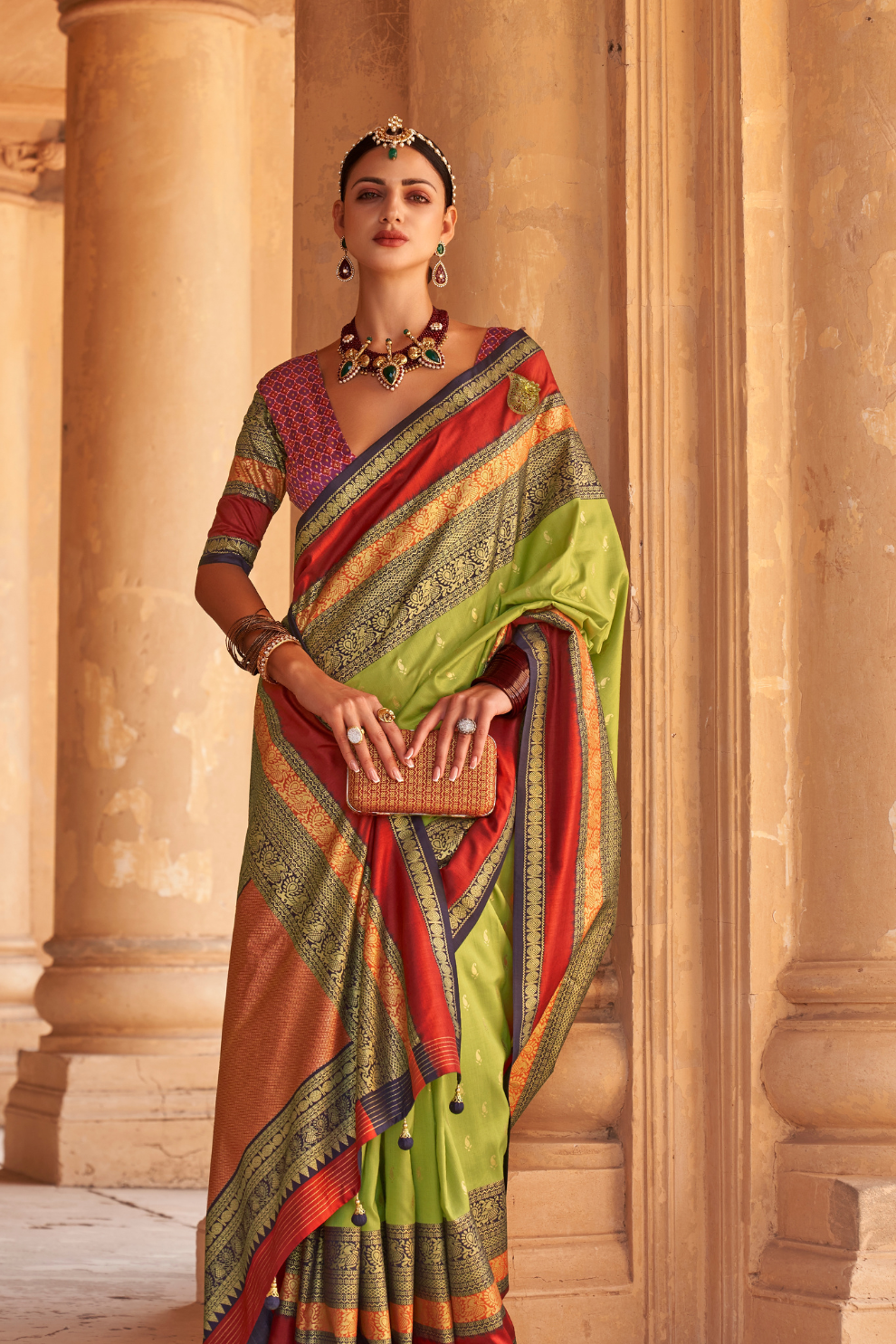 Kanjivaram Style Silk Saree with Designer Brooch and Clutch