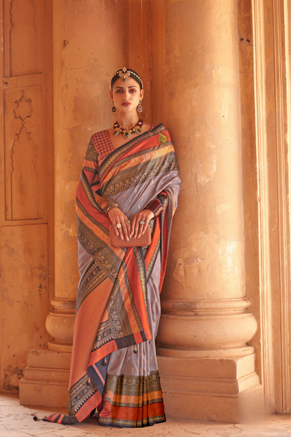 Kanjivaram Style Silk Saree with Designer Brooch and Clutch