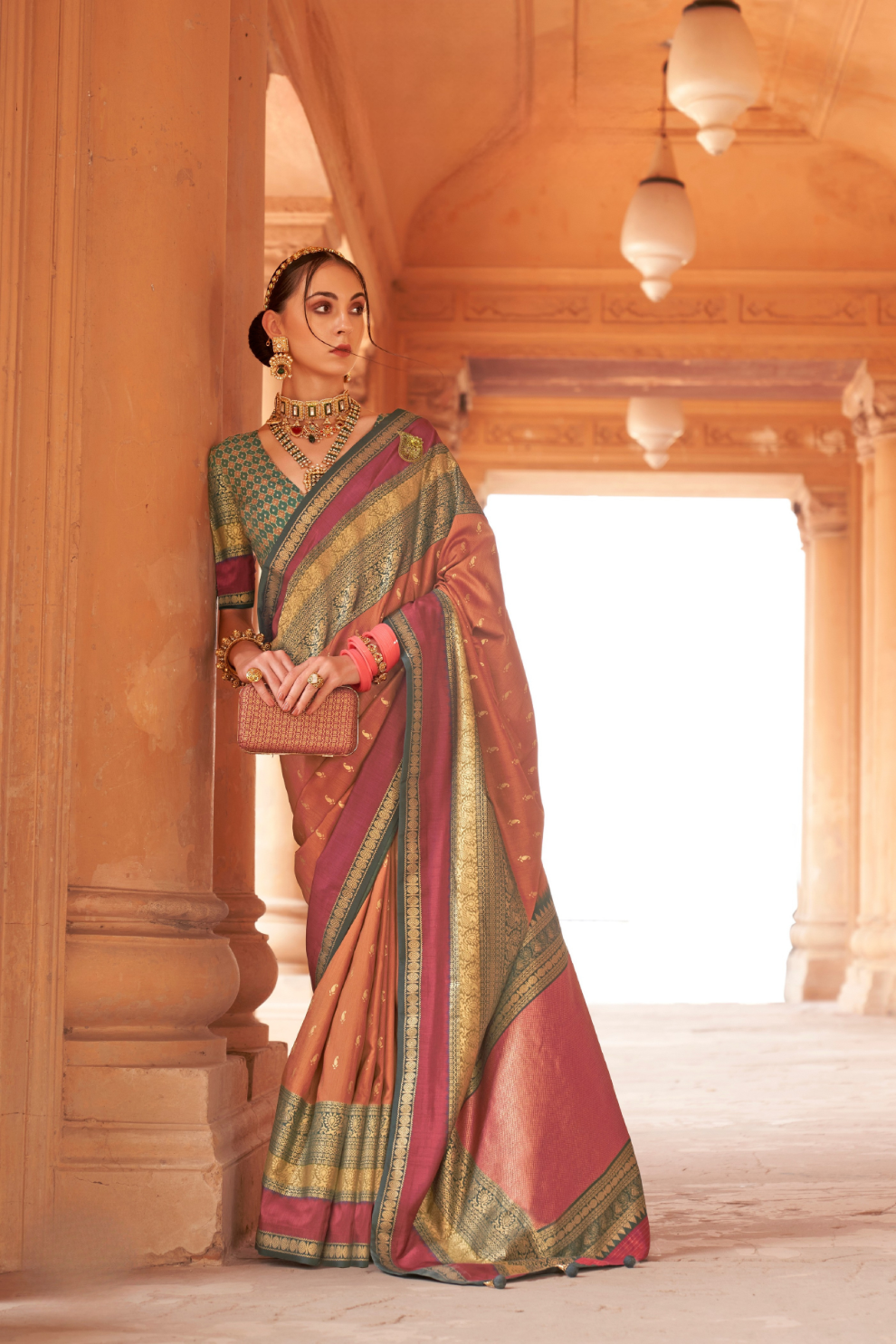 Kanjivaram Style Silk Saree with Designer Brooch and Clutch