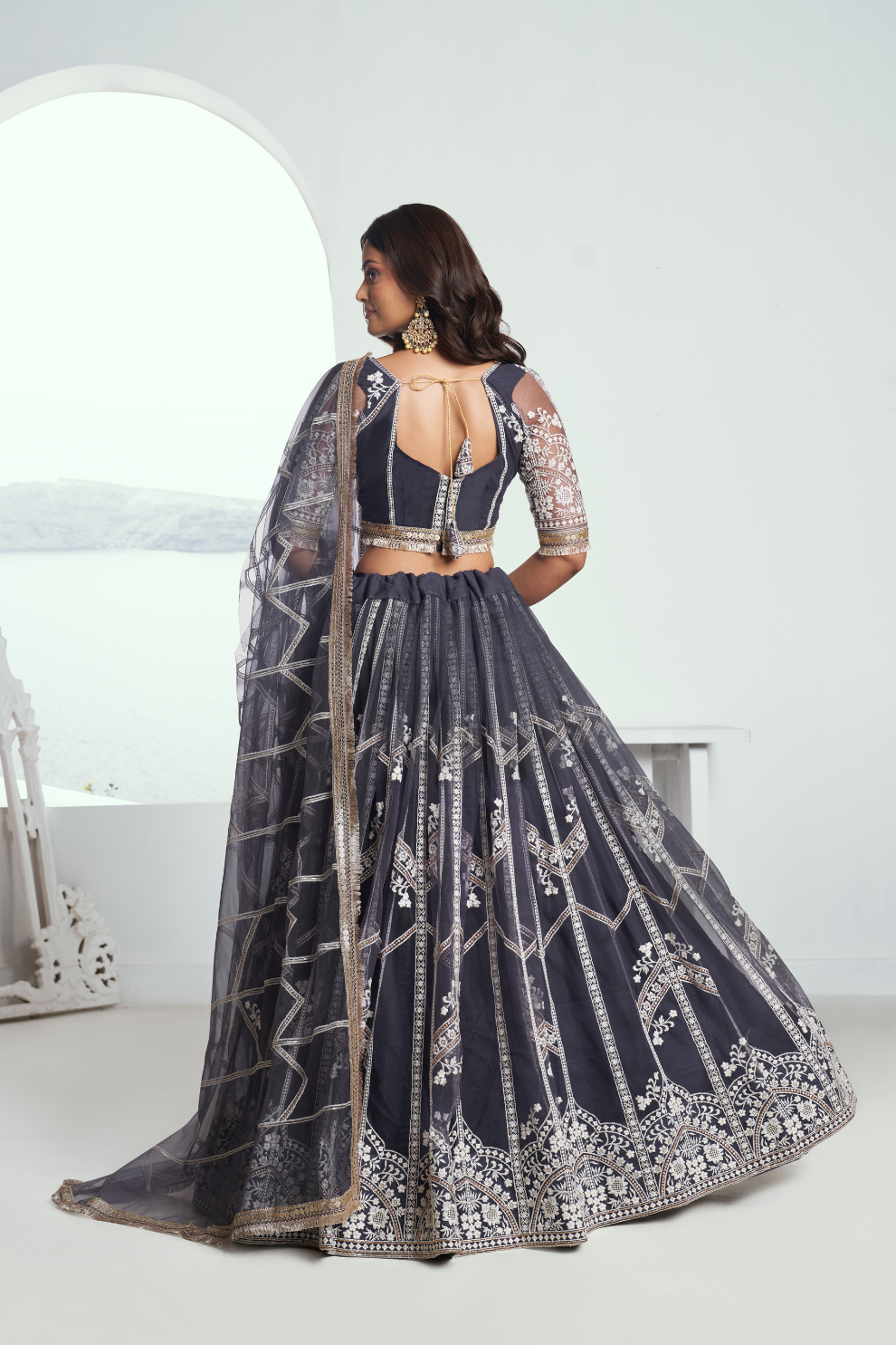 Graceful Net Lehenga Choli with Intricate Embroidery for Engagement Wear
