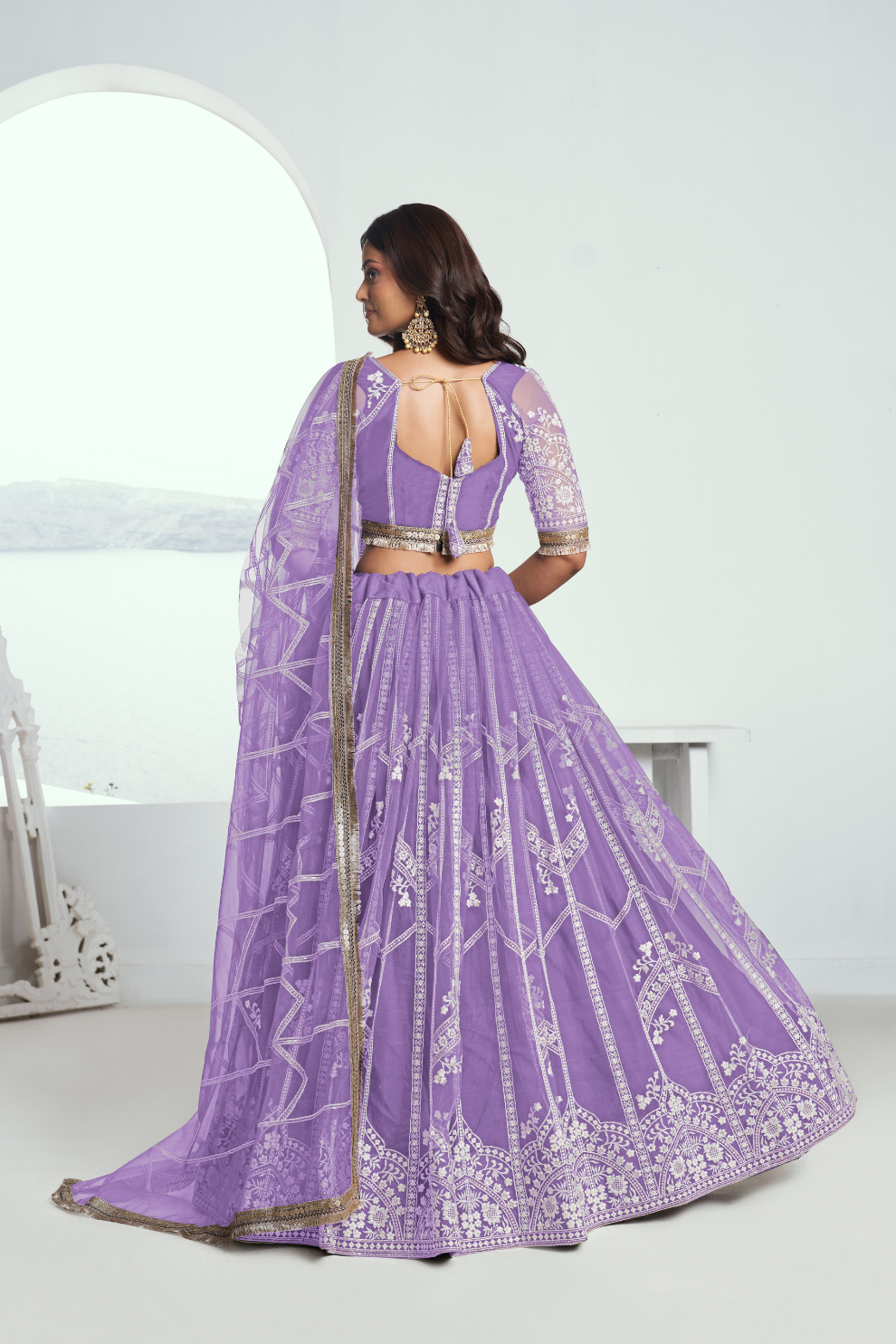 Graceful Net Lehenga Choli with Intricate Embroidery for Engagement Wear