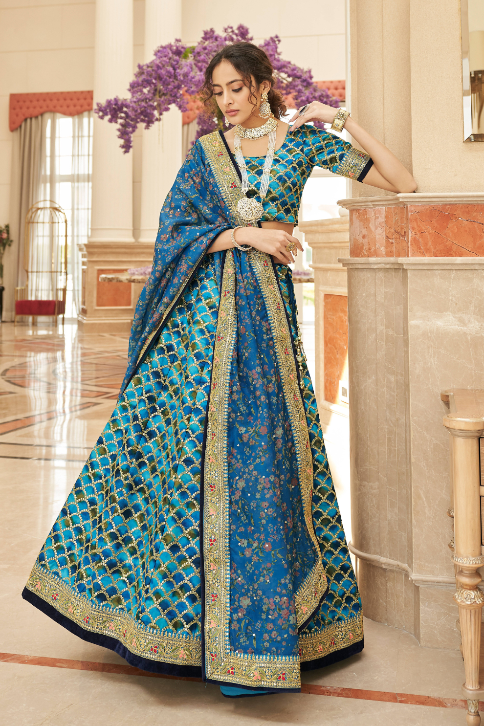 Elegant blouse and soft net dupatta with border detailing