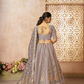Luxurious Tissue Lehenga Adorned with Banarasi Patches and Zari Craftsmanship