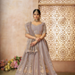 Luxurious Tissue Lehenga Adorned with Banarasi Patches and Zari Craftsmanship