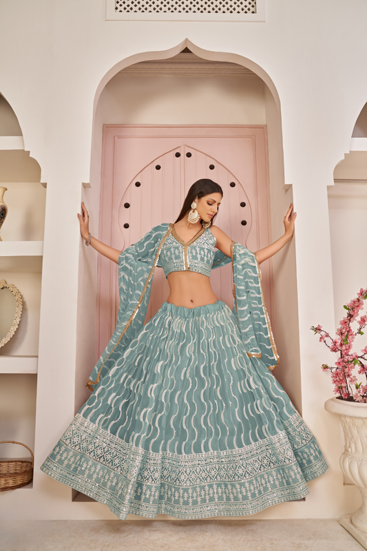Beautifully Embroidered Net Lehenga with Sequin and Thread Detailing