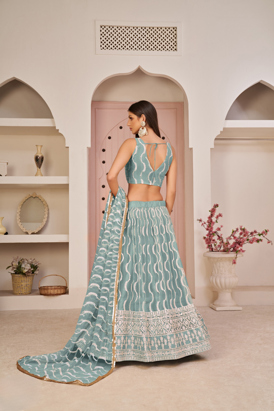 Beautifully Embroidered Net Lehenga with Sequin and Thread Detailing